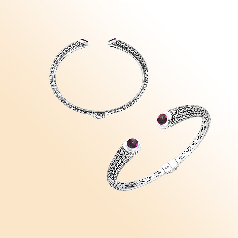 Sterling silver Bali engraved hinge cuff bracelet featuring iridescent mystic quartz stones and polished–oxidized artistry, designed for those who appreciate expressive handcrafted artisan jewelry.