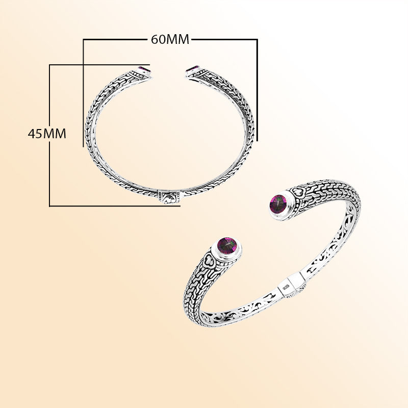 Sterling silver Bali engraved hinge cuff bracelet featuring iridescent mystic quartz stones and polished–oxidized artistry, designed for those who appreciate expressive handcrafted artisan jewelry.
