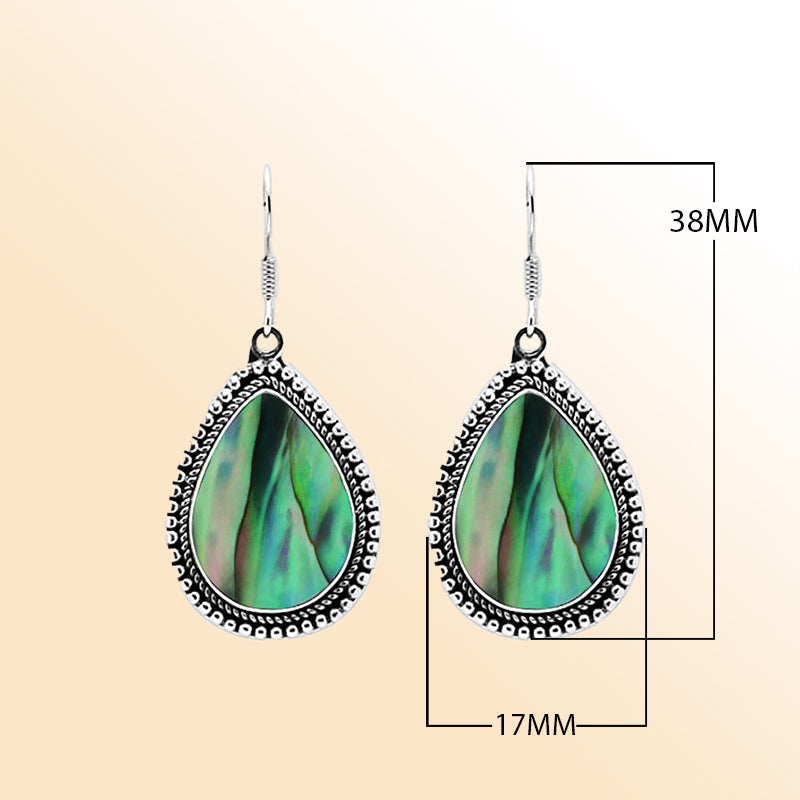 Sterling silver teardrop Abalone earrings with shimmering iridescent shell and detailed Bali beaded design, handcrafted artisan jewelry for women.