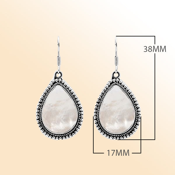 Sterling silver teardrop Mother of Pearl earrings with shimmering gemstone and detailed Bali beaded design, handcrafted artisan jewelry for women.