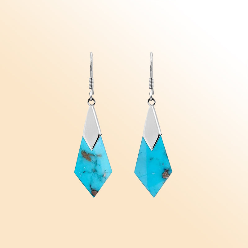 Sterling silver turquoise drop earrings for women

Elegant geometric turquoise gemstone earrings with silver accents
