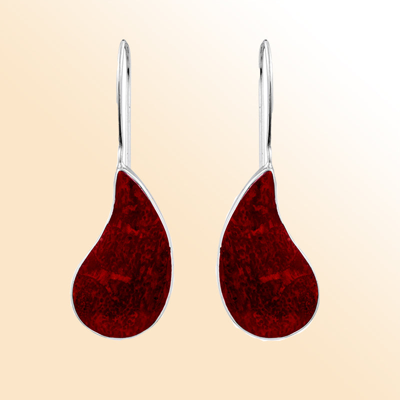 "Elegant sterling silver teardrop earrings with vibrant red coral gemstone, handcrafted jewelry for women."