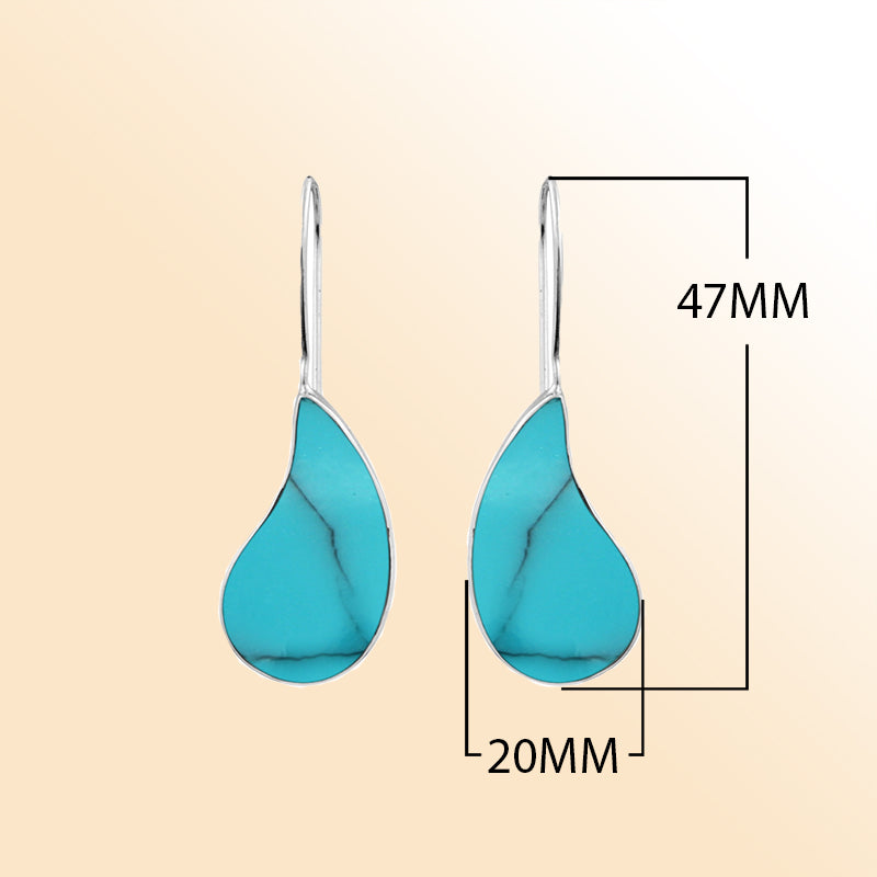 "Sterling silver teardrop earrings with genuine turquoise stone, handcrafted Bali artisan jewelry for women."