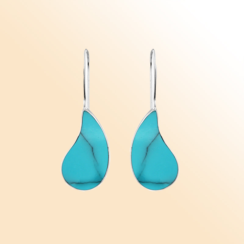 "Sterling silver teardrop earrings with genuine turquoise stone, handcrafted Bali artisan jewelry for women."