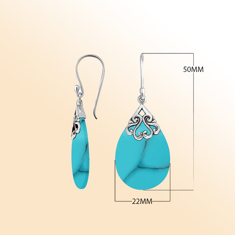 Sterling silver turquoise teardrop earrings with scroll accent for women