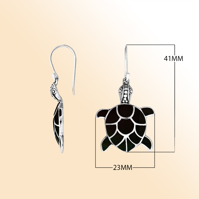 Sterling silver turtle earrings with sleek black shell inlay and artisan silver detailing