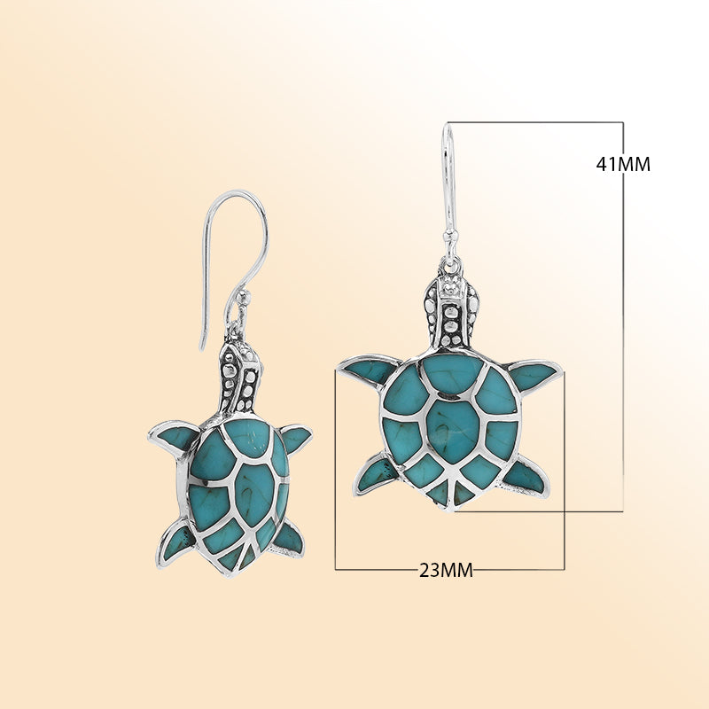 Sterling silver sea turtle earrings with turquoise inlay, symbolic ocean jewelry for everyday wear or gifting