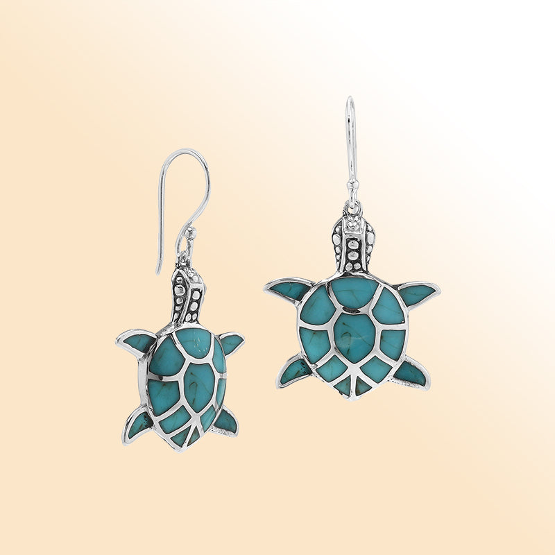 Sterling silver sea turtle earrings with turquoise inlay, symbolic ocean jewelry for everyday wear or gifting