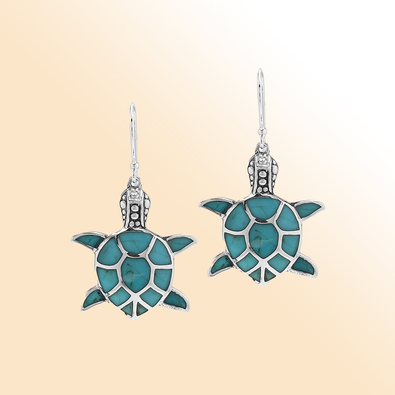 Sterling silver sea turtle earrings with turquoise inlay, symbolic ocean jewelry for everyday wear or gifting