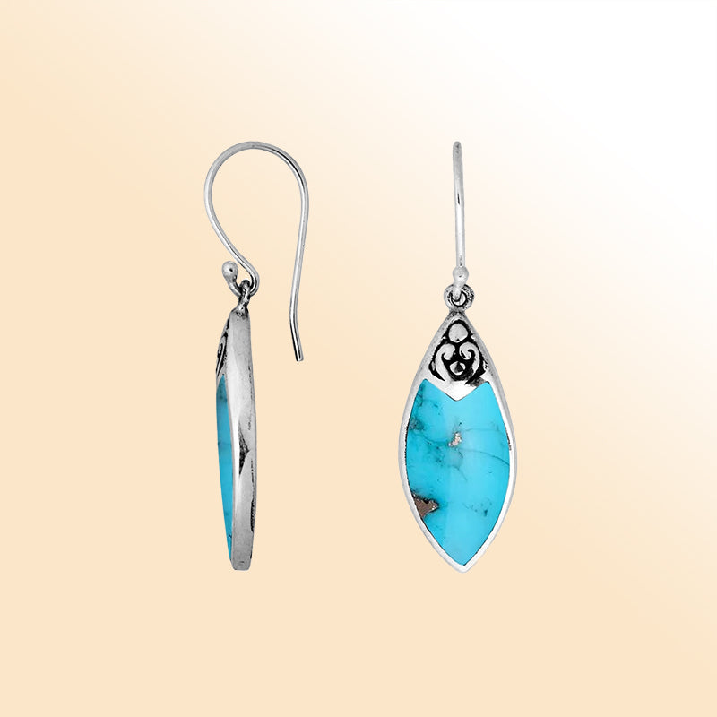 Handcrafted sterling silver marquise drop earrings with vibrant turquoise shell and Balinese scrollwork design