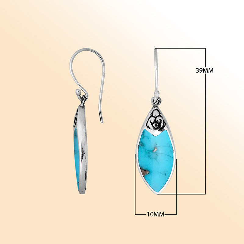 Handcrafted sterling silver marquise drop earrings with vibrant turquoise shell and Balinese scrollwork design