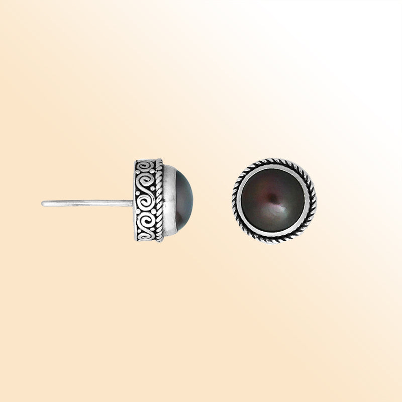 Silver stud earrings featuring natural  Gray Pearl with ornate Bali scrollwork.