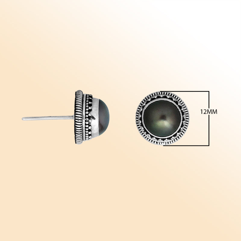 Silver stud earrings featuring Gray Pearls with ornate dotted Bali detailing.