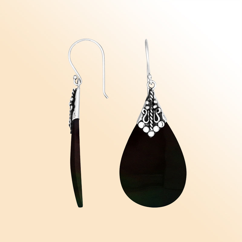 Elegant Black Shell teardrop earrings with ornate silver detailing and earwire lock
