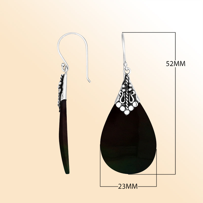 Elegant Black Shell teardrop earrings with ornate silver detailing and earwire lock