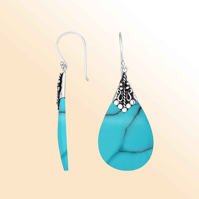 Elegant Turquoise Shell teardrop earrings with ornate silver detailing and earwire lock