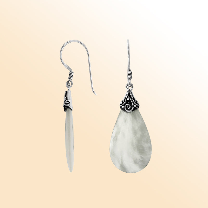 Elegant Mother Of Pearl teardrop earrings with silver swirl detailing and earwire lock