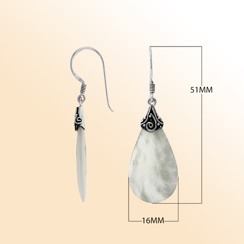 Elegant Mother Of Pearl teardrop earrings with silver swirl detailing and earwire lock