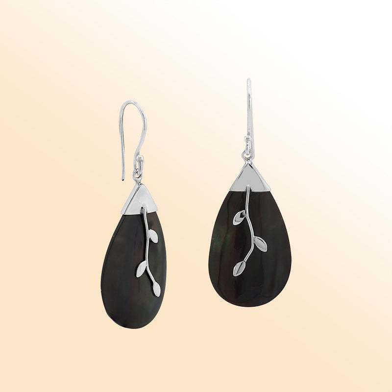 Artistic silver teardrop earrings with black shell