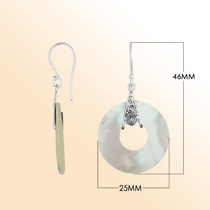 A stunning pair of 925 sterling silver earrings featuring round Mother Of Pearl drops with detailed Balinese filigree work and secure earwire hook design.