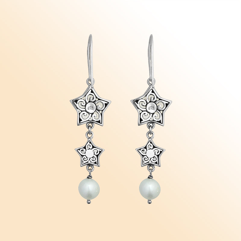 Artistic Mother Of Pearl star earrings with pearl