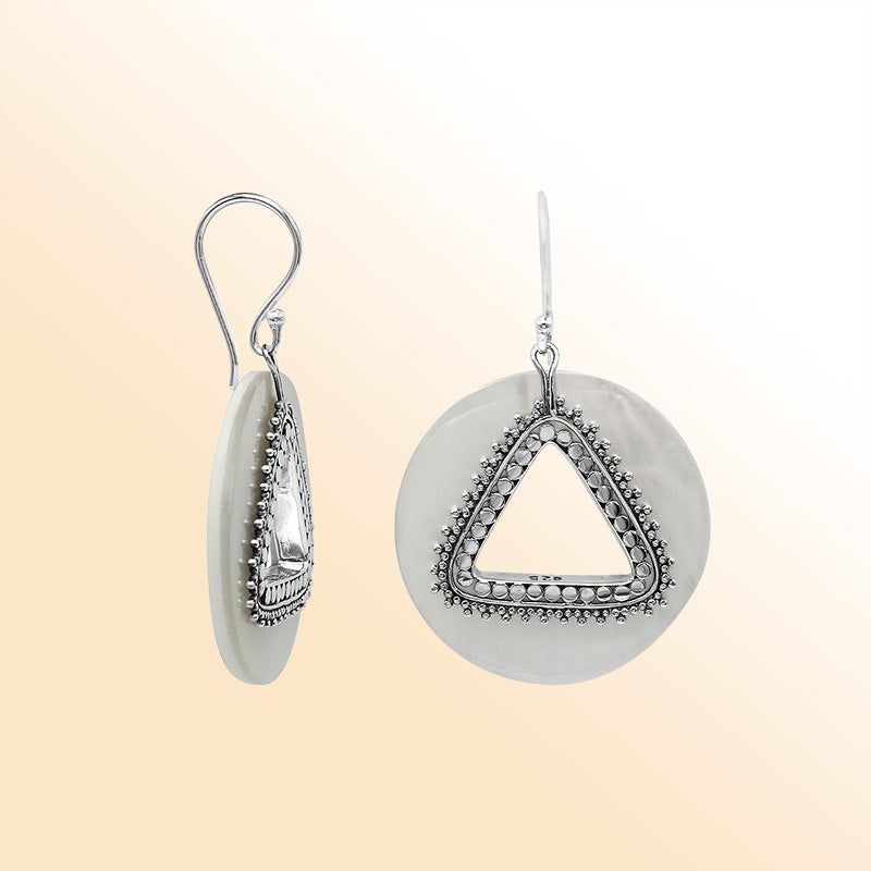 Artistic Mother Of Pearl round earrings with silver beaded triangle cut-out.