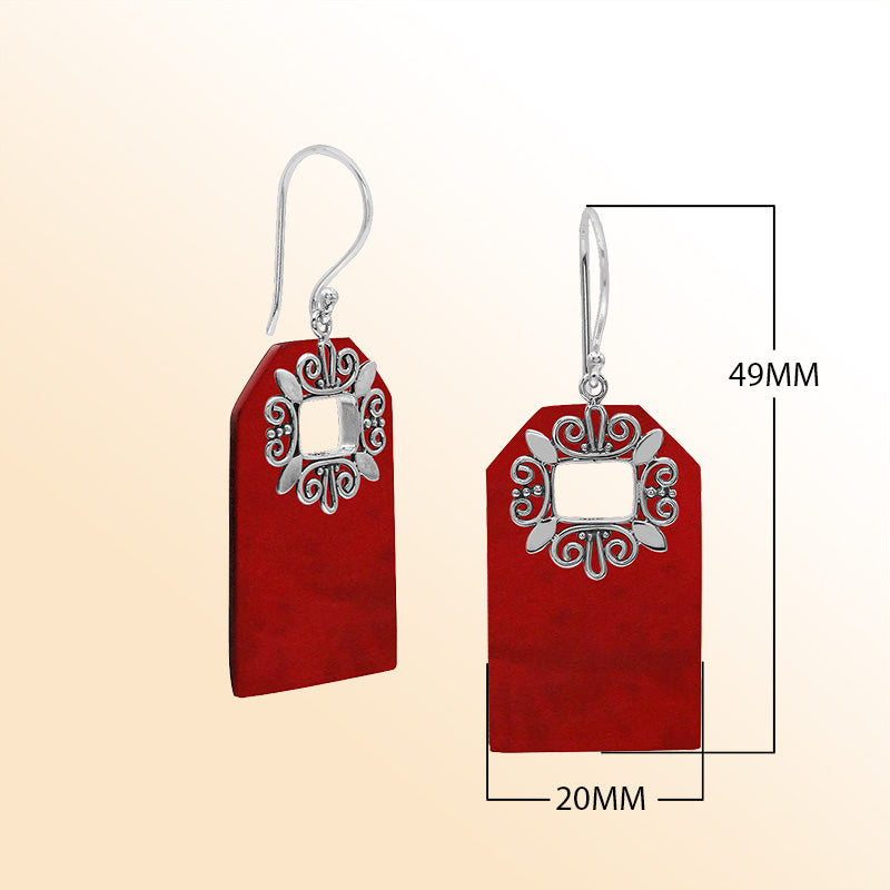 Artistic Red Coral earrings with ornate silver filigree