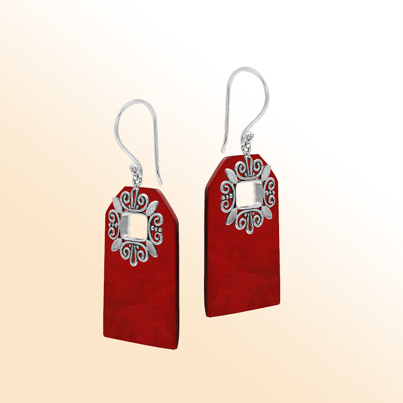 Artistic Red Coral earrings with ornate silver filigree