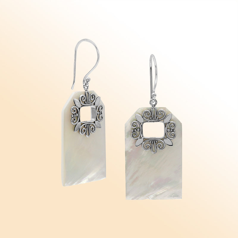 Artistic Mother of Pearl earrings with ornate silver filigree