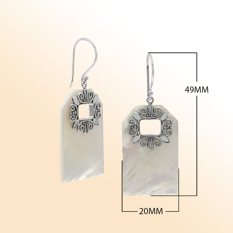Artistic Mother of Pearl earrings with ornate silver filigree
