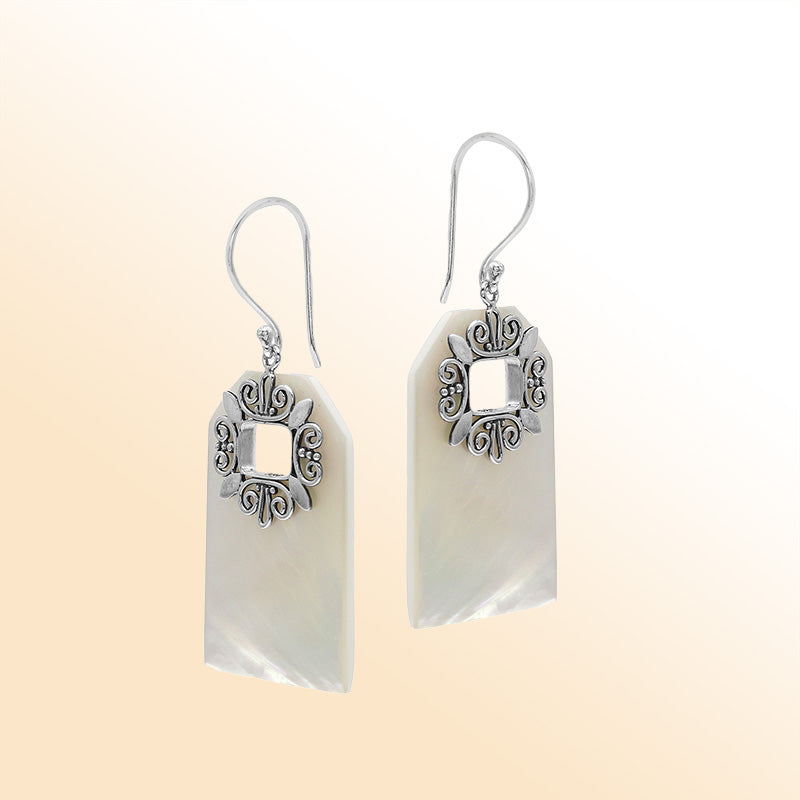 Artistic Mother of Pearl earrings with ornate silver filigree