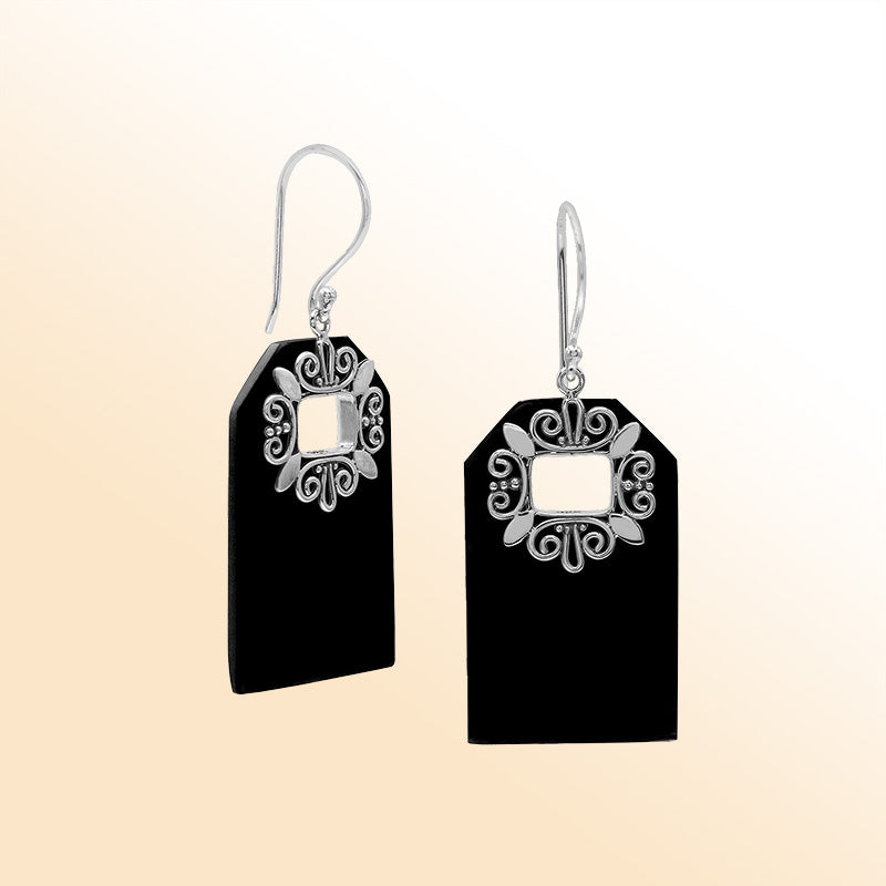 Artistic Black Shell earrings with decorative silver filigree