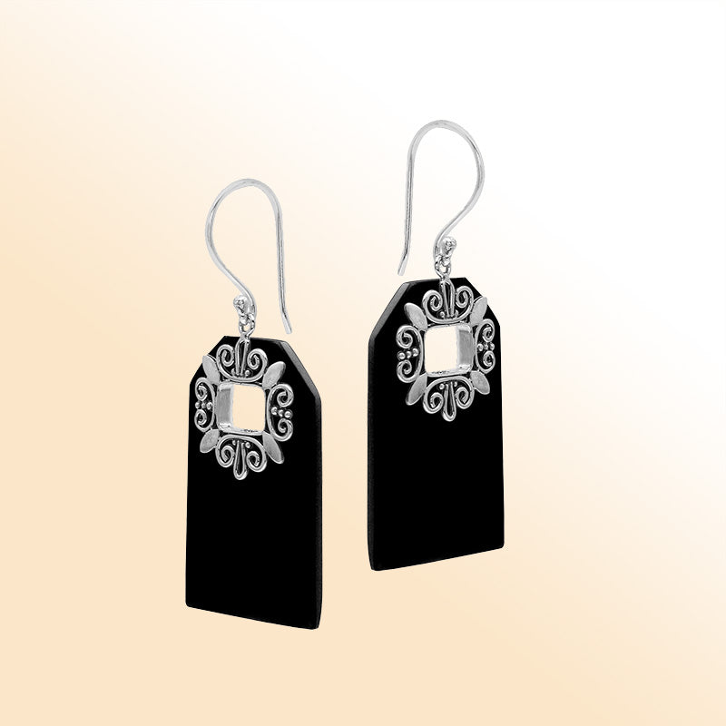 Artistic Black Shell earrings with decorative silver filigree