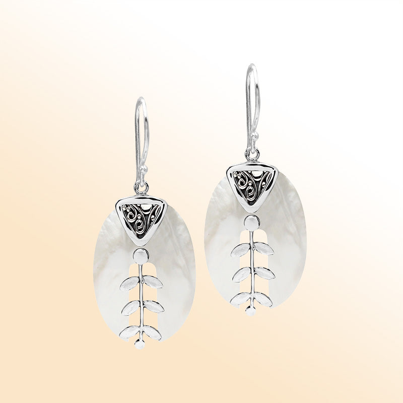 Artistic Mother of Pearl earrings with silver leaf and filigree details