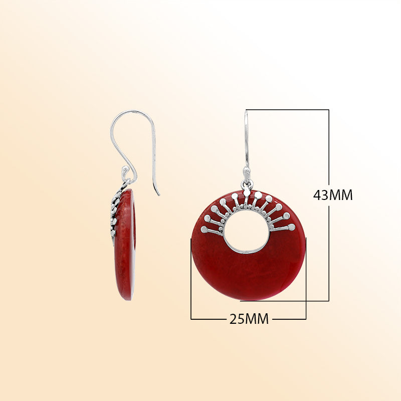 Elegant sterling Silver Red Coral earrings with open circle styling and polished sunburst silver accents.