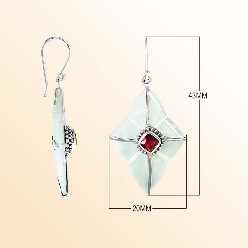 Sterling silver Moonlit Bloom Mother Of Pearl and Garnet Quartz earrings with luminous petal inlays, crimson faceted centers, and sculpted silver lines