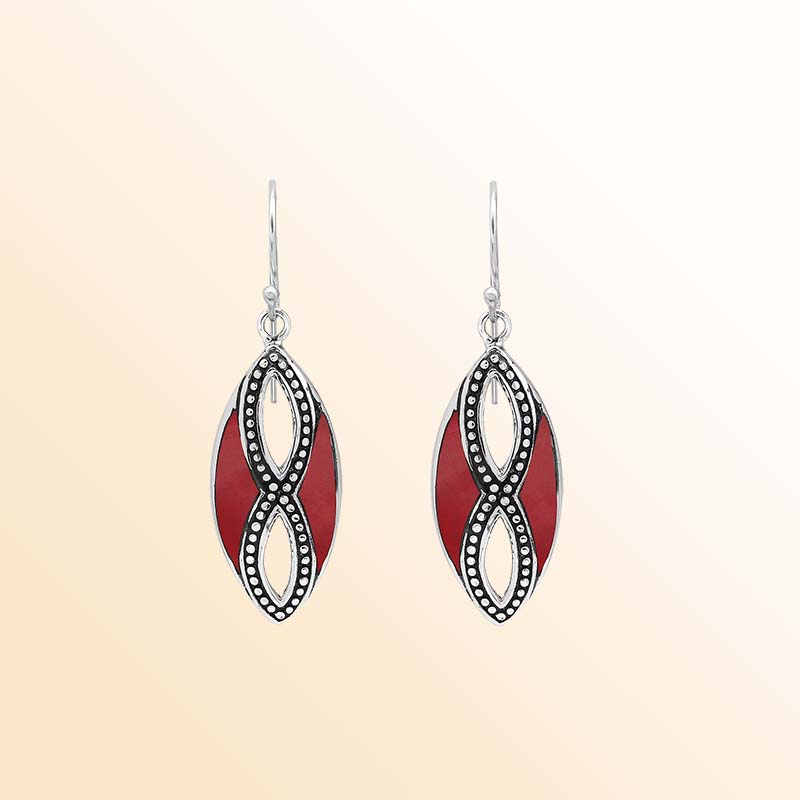 Elegant Sterling Silver Red Coral drop earrings showcasing rich crimson inlays, intricate infinity-shaped silver openwork, delicate oxidized bead accents, polished marquise frames, and graceful fishhook ear wires.