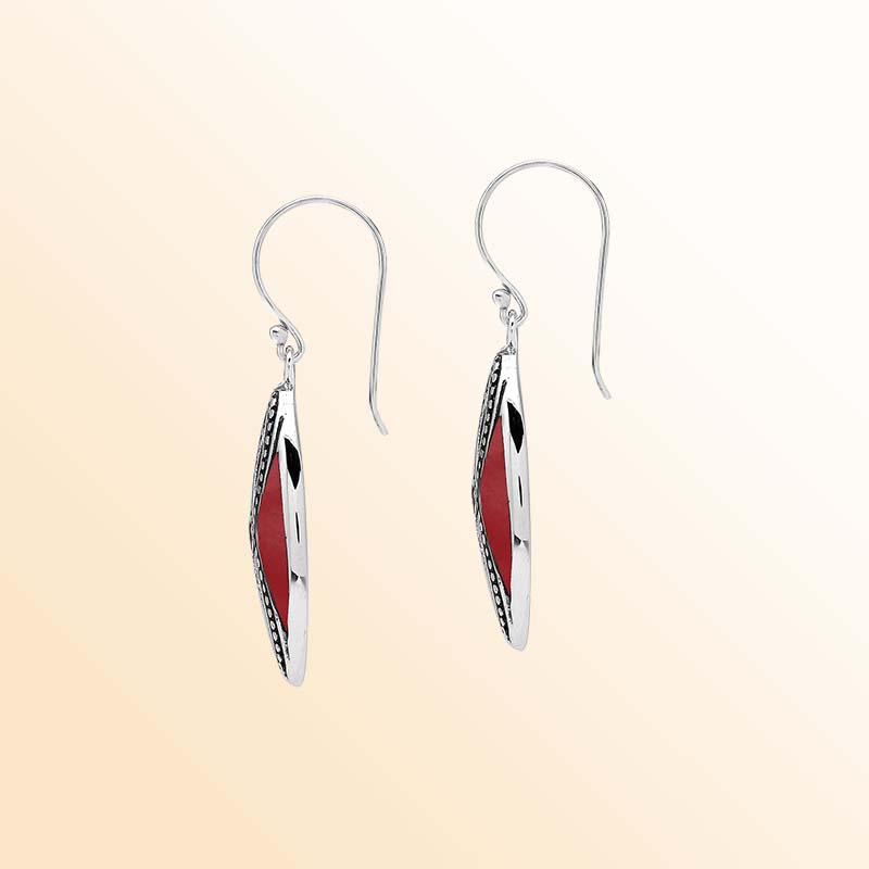 Elegant Sterling Silver Red Coral drop earrings showcasing rich crimson inlays, intricate infinity-shaped silver openwork, delicate oxidized bead accents, polished marquise frames, and graceful fishhook ear wires.