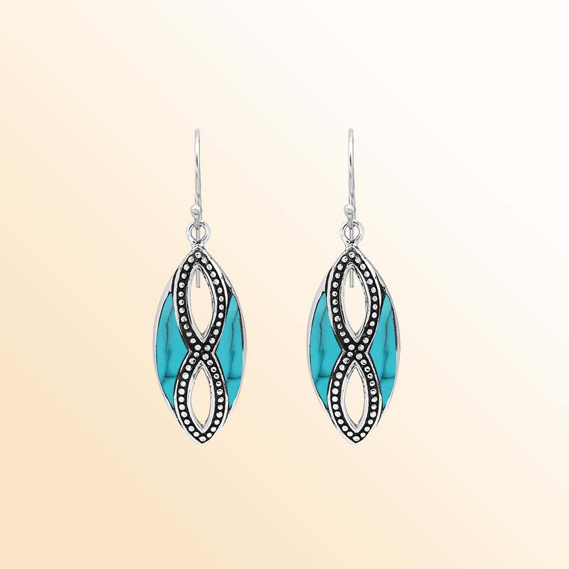 Elegant Sterling Silver Turquoise Shell drop earrings showcasing vivid tropical blue inlays, intricate infinity-shaped silver openwork, delicate oxidized beaded accents, polished marquise frames, and graceful fishhook ear wires.