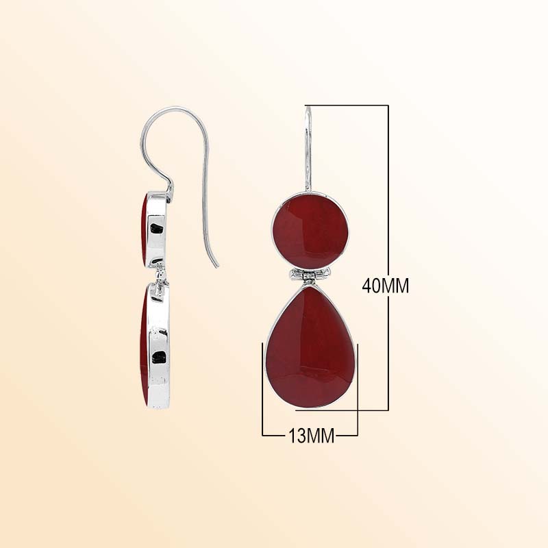 Elegant sterling silver Red Coral earrings featuring rich crimson round and teardrop drops, polished silver bezel frames, articulated movement, and graceful elongated ear wires.