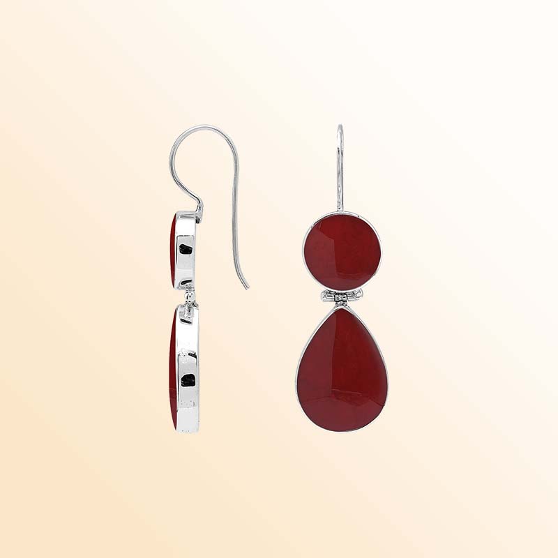 Elegant sterling silver Red Coral earrings featuring rich crimson round and teardrop drops, polished silver bezel frames, articulated movement, and graceful elongated ear wires.