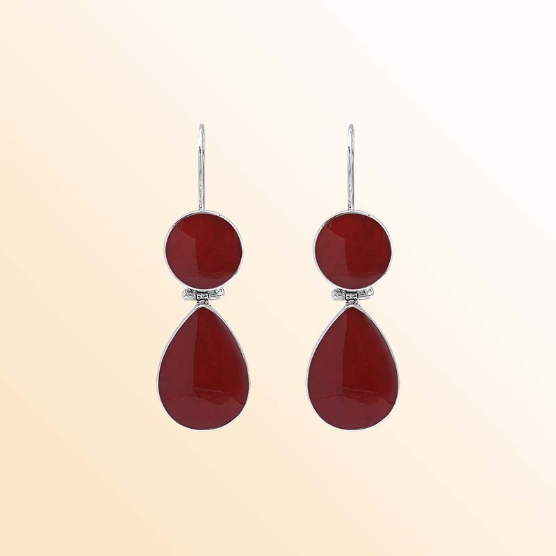 Elegant sterling silver Red Coral earrings featuring rich crimson round and teardrop drops, polished silver bezel frames, articulated movement, and graceful elongated ear wires.