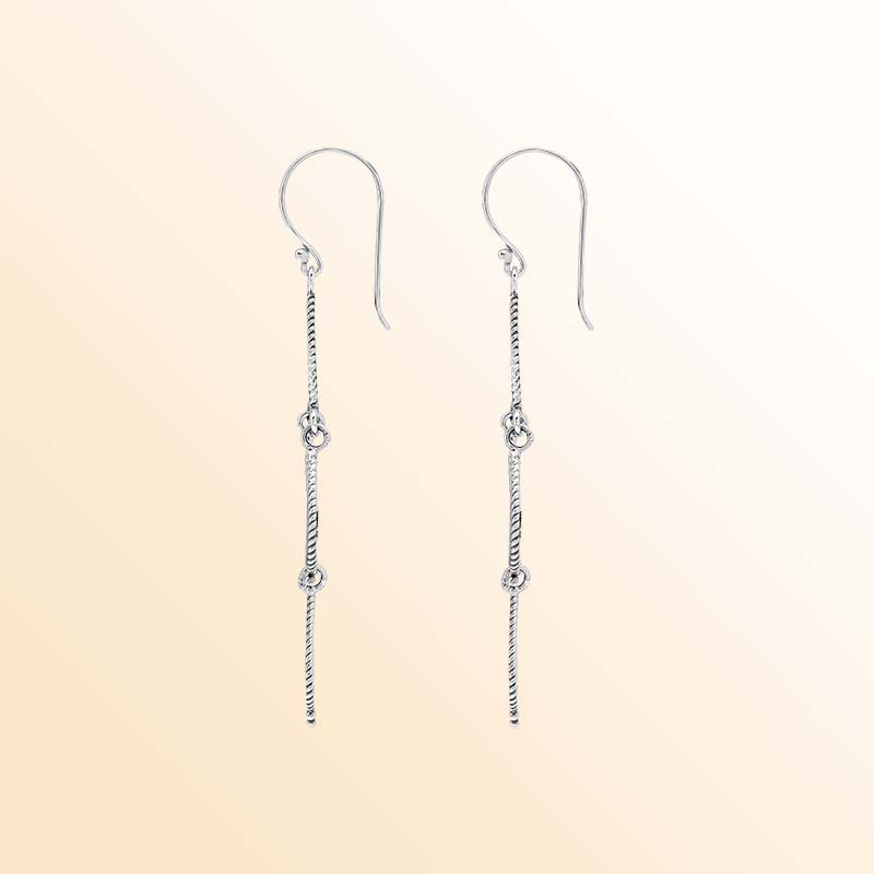 Artistic sterling silver chandelier earrings with cascading open teardrop frames, twisted rope detailing, delicate bead accents, elongated ear wires, and graceful articulated movement.