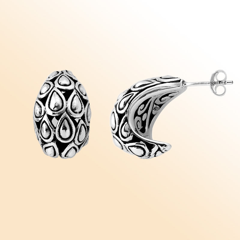 Artistic Sterling Silver Hoop Earrings With Teardrop Pattern