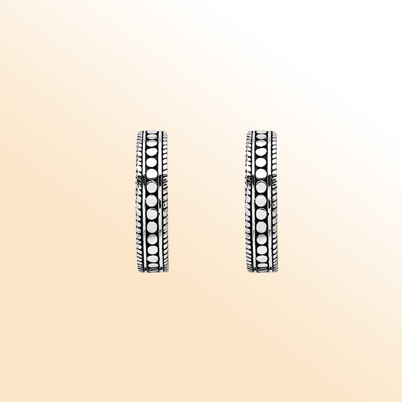 Artistic silver hoop earrings with dotted center and rope edges