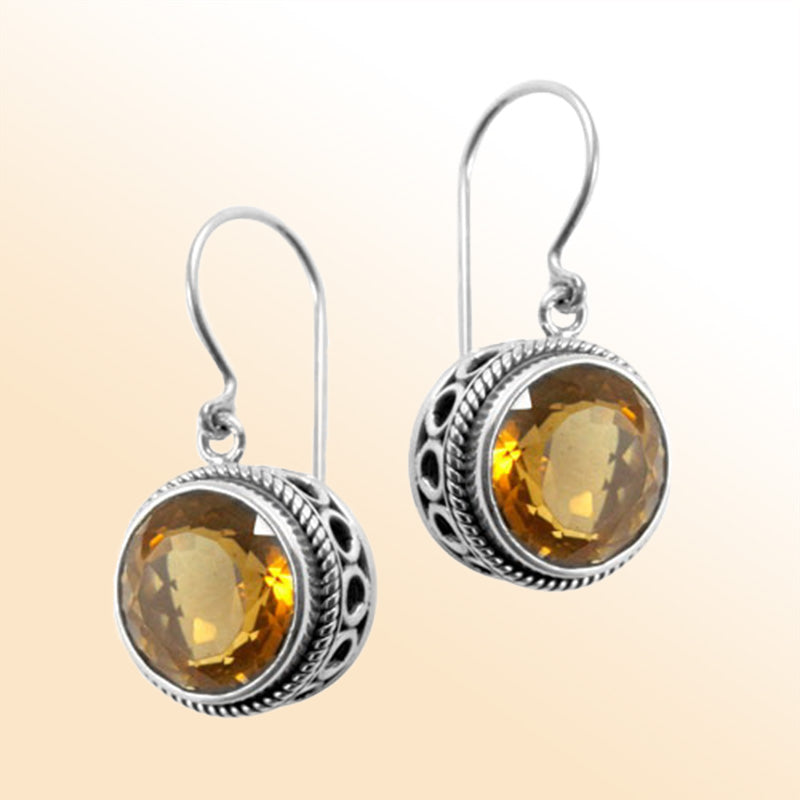 Sterling silver halo drop earrings featuring Citrine Quartz with ornate Bali detailing and earwire lock.