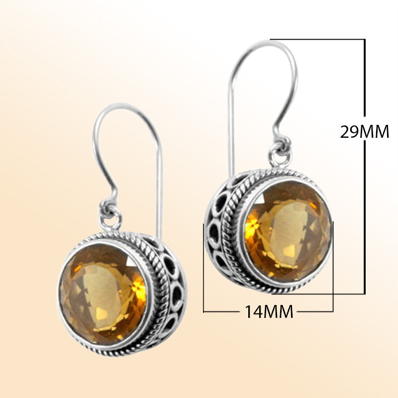 Sterling silver halo drop earrings featuring Citrine Quartz with ornate Bali detailing and earwire lock.
