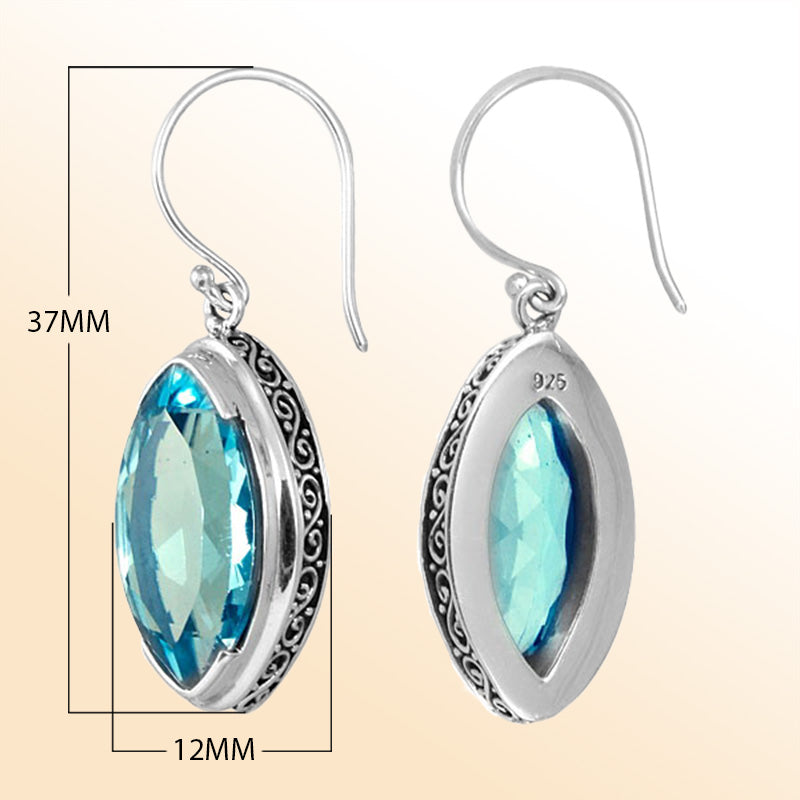 Sterling silver artisan marquise drop earrings featuring Blue Topaz Quartz with intricate detailing and earwire lock.