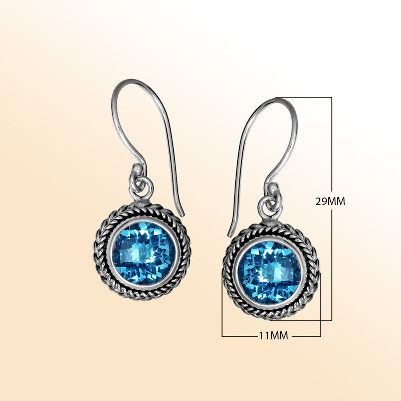 Sterling silver artisan Blue Topaz Quartz braided-frame drop earrings with polished finish and earwire lock.