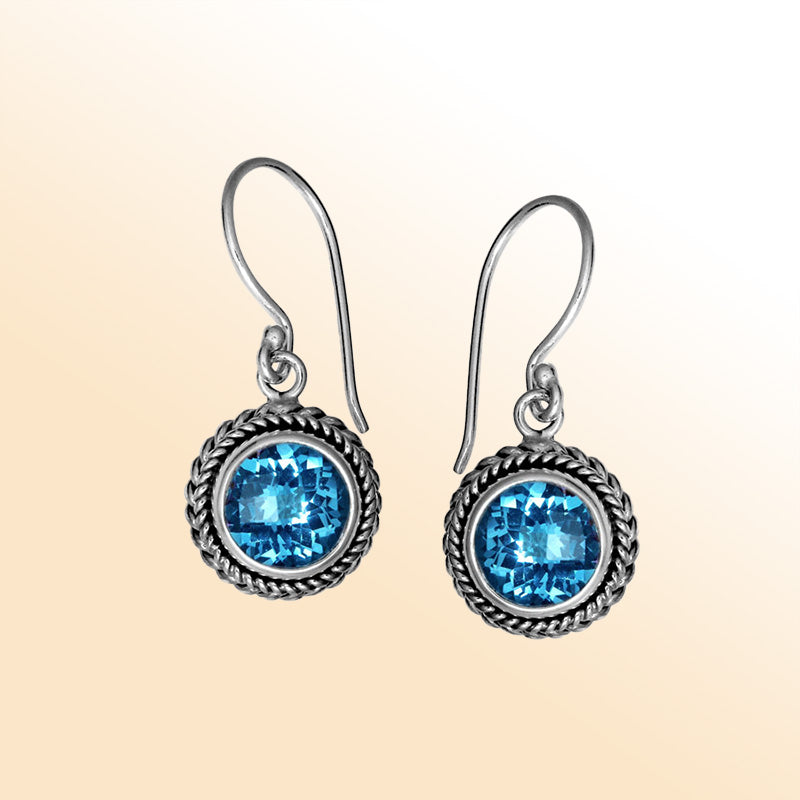 Sterling silver artisan Blue Topaz Quartz braided-frame drop earrings with polished finish and earwire lock.